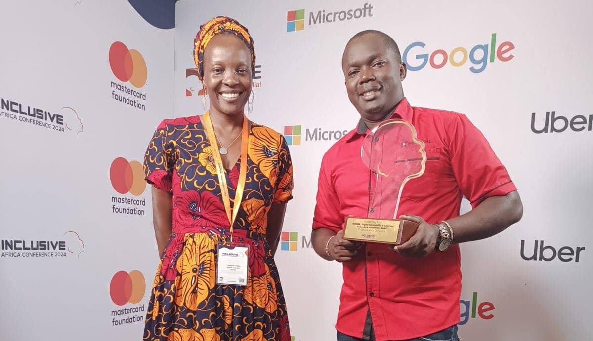 eKitabu Monthly Newsletter May 2024 Georgine Auma and Vincent Odhiambo of eKitabu accepting the top Innovation Award at inABLE